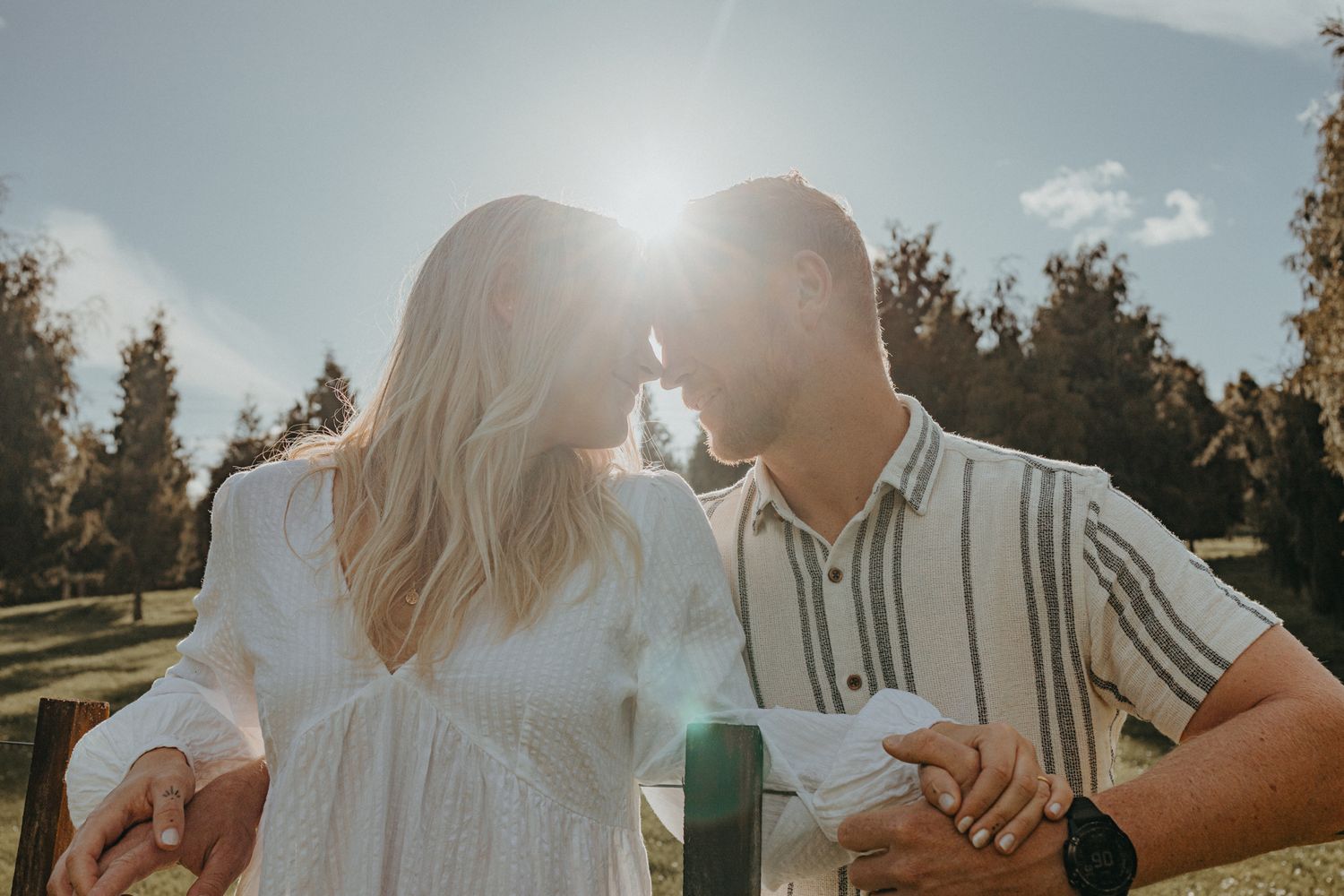 Sweet engaged couple with their dog for their engagement shoot with Apertured Media-Auckland Wedding Photographer