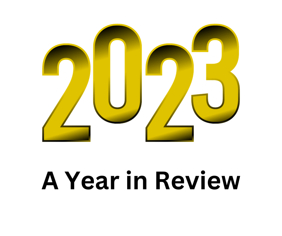Yellow 3D text '2023' with 'A Year in Review' subtitle on white background.