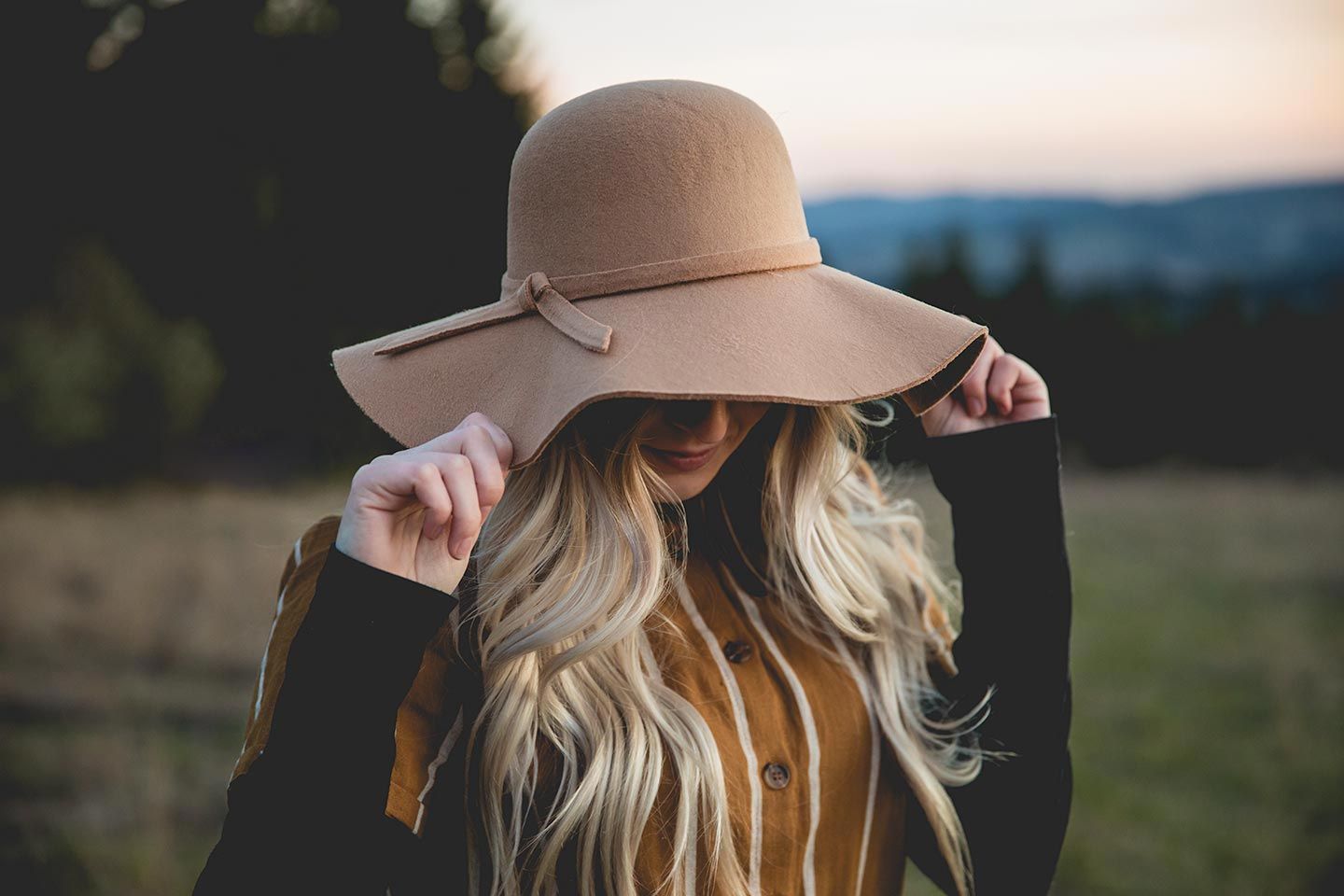 senior girl wearing stylish hat