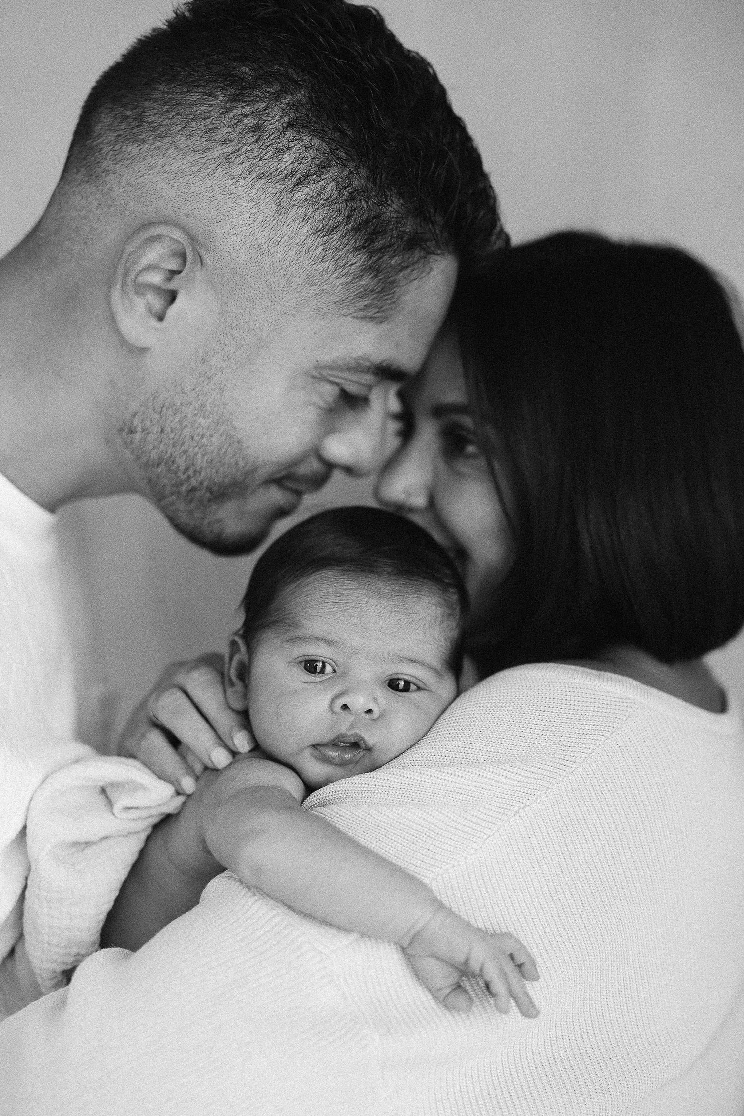 Sweet newborn baby photoshoot with mom and dad at Spark Studio Huntington Beach