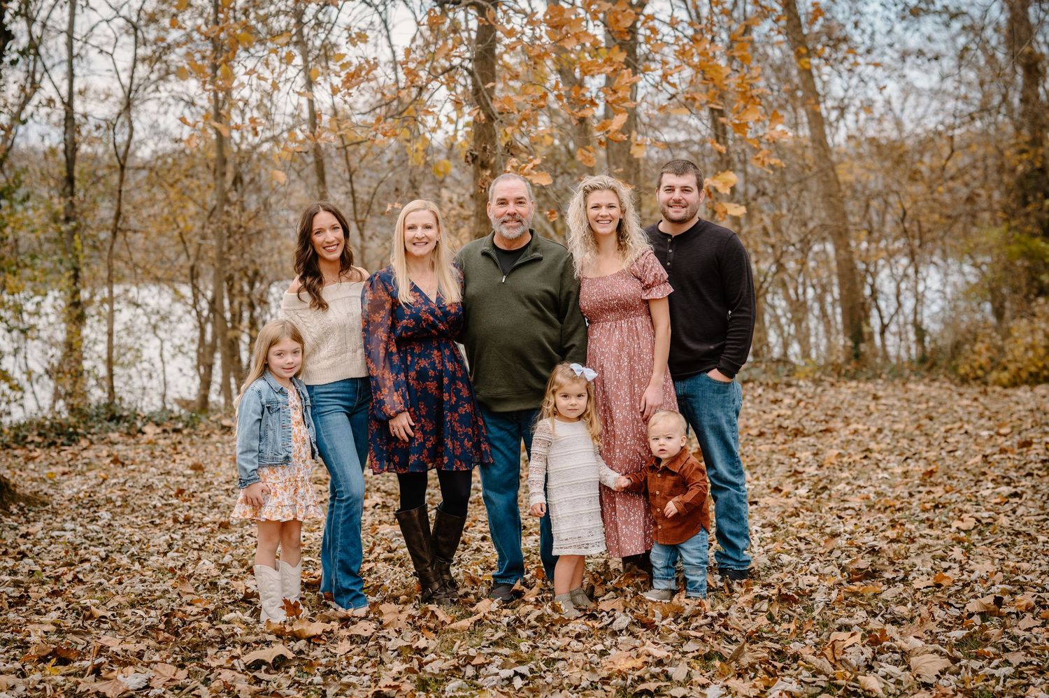Family wearing coordinated fall outfits during a Cincinnati family photography session