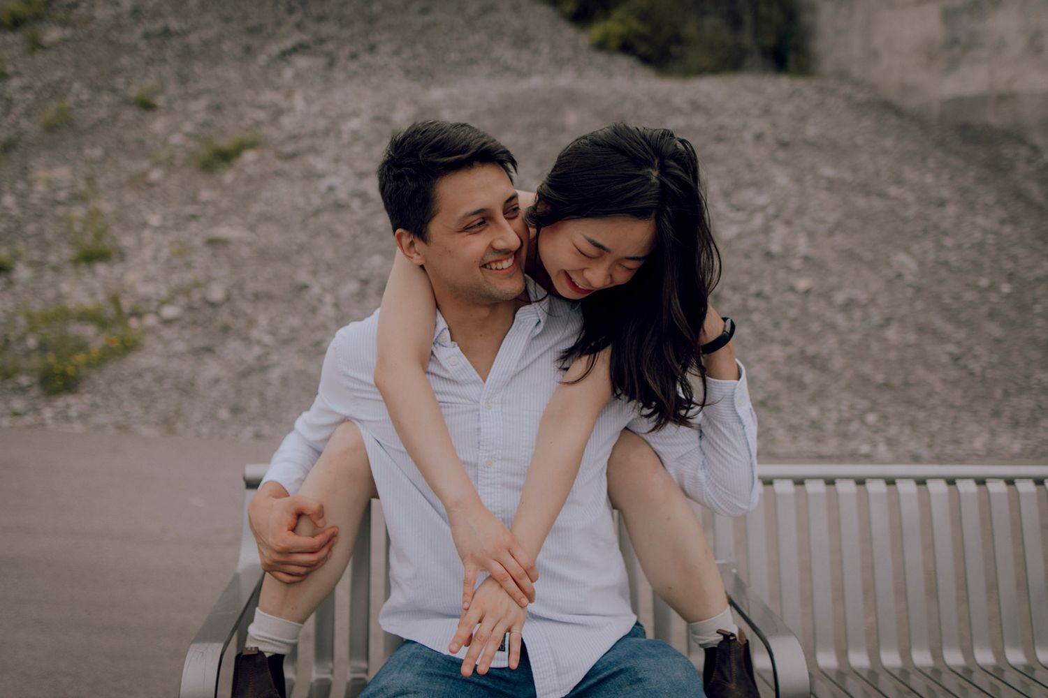 Real couple sharing a genuine laugh during a narrative portrait session, Kingston Ontario Lumenali Photography. Cinematic Storytelling