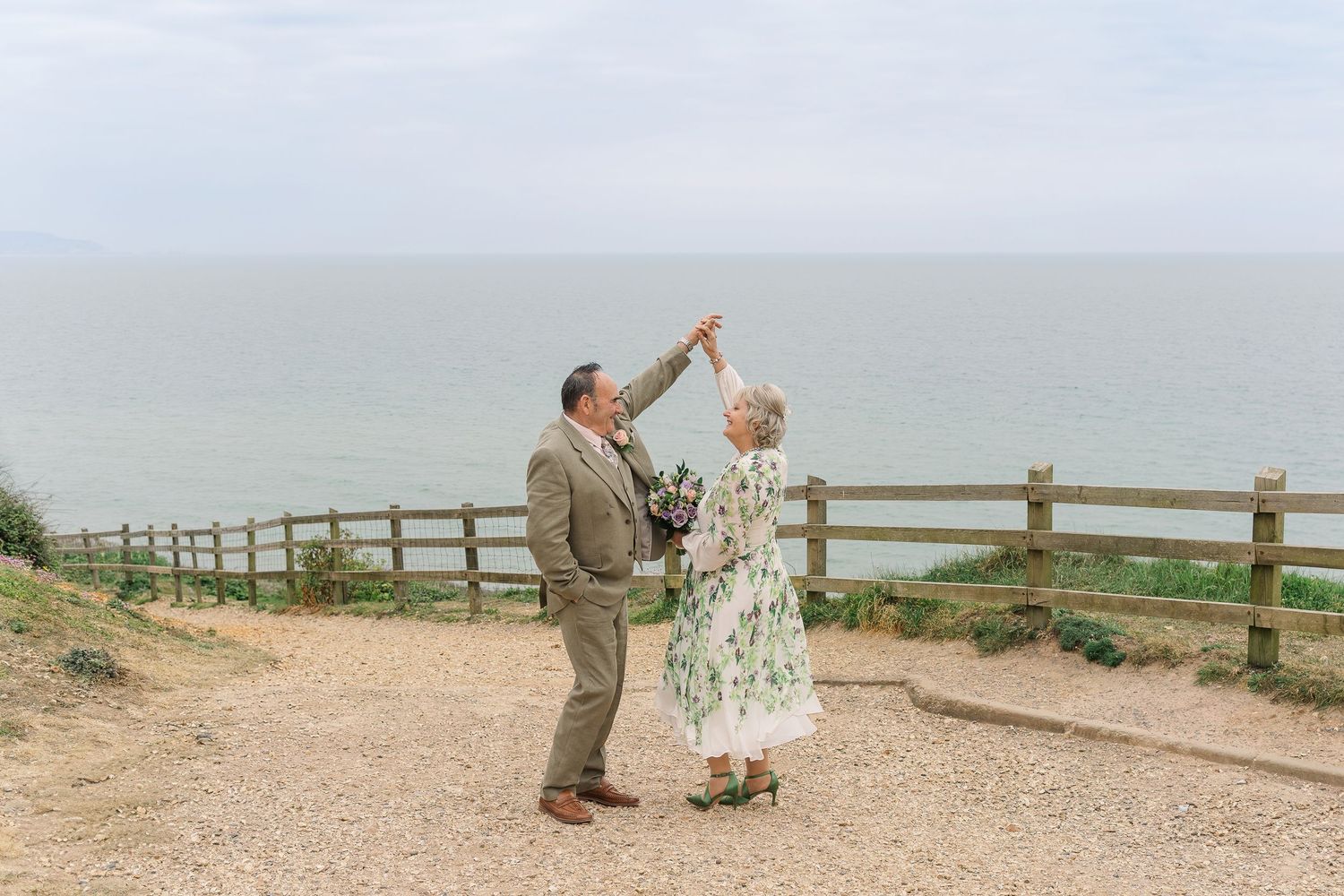 Barton on sea cliff top dancing wedding photo