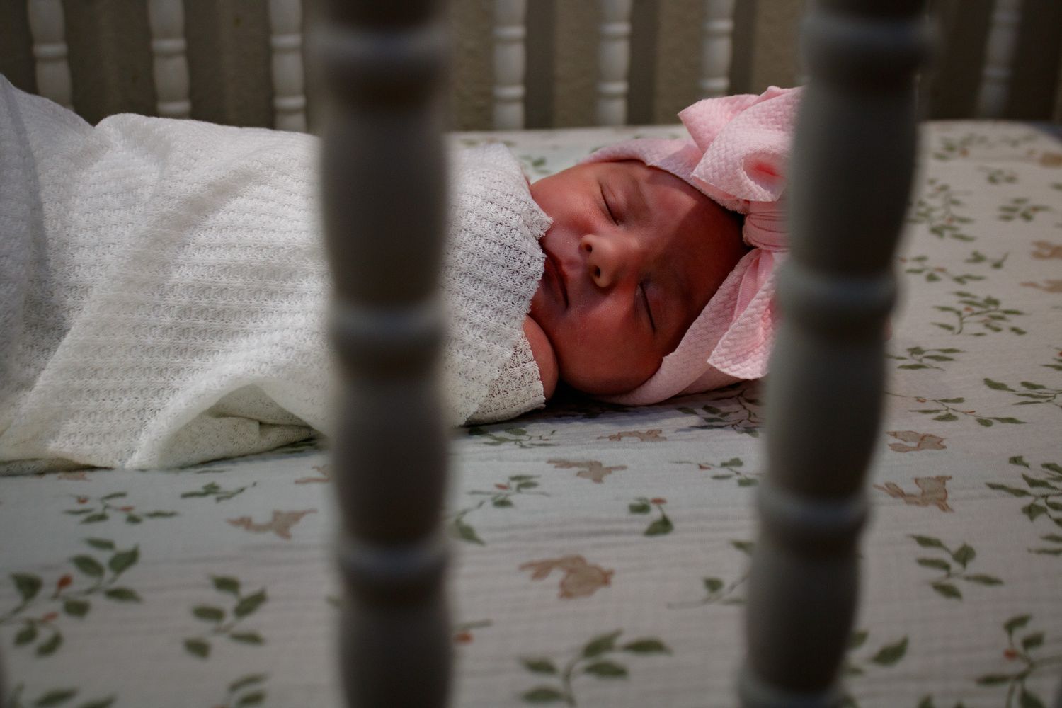 A baby girl during a newborn photo session in Spearman, Texas