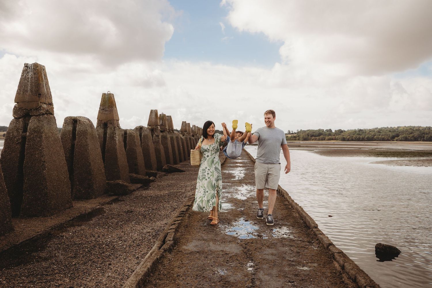 Edinburgh family photographer , beach photoshoot with family and dog, Cramond beach , windy day , sunny weather