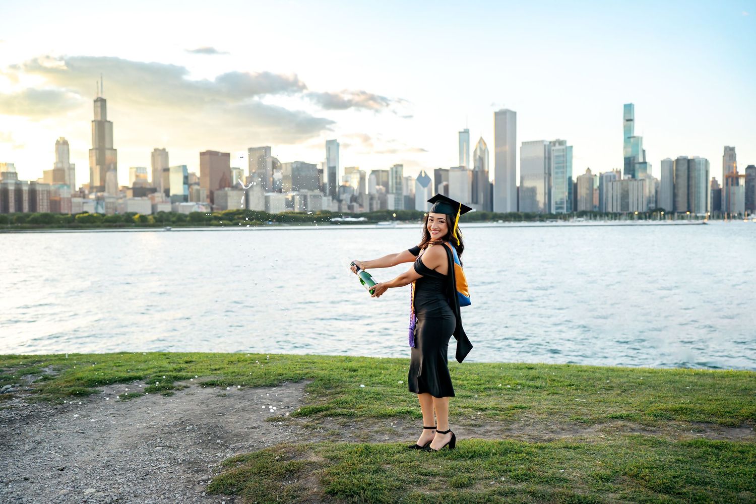 A panoramic sequence showing someone doing a cartwheel on a beach with the Miami skyline in the background.