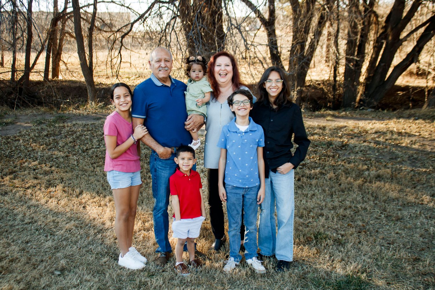 Grandparents and their grandchildren during an extended family photo session at The League House in Amarillo, Texas