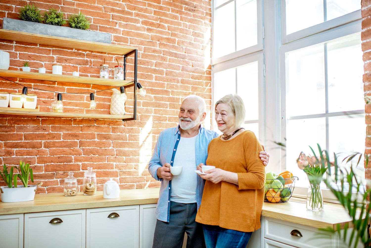couple in their 80's deciding on what the best healthcare insurance would be for them with Medicaid & Medicare