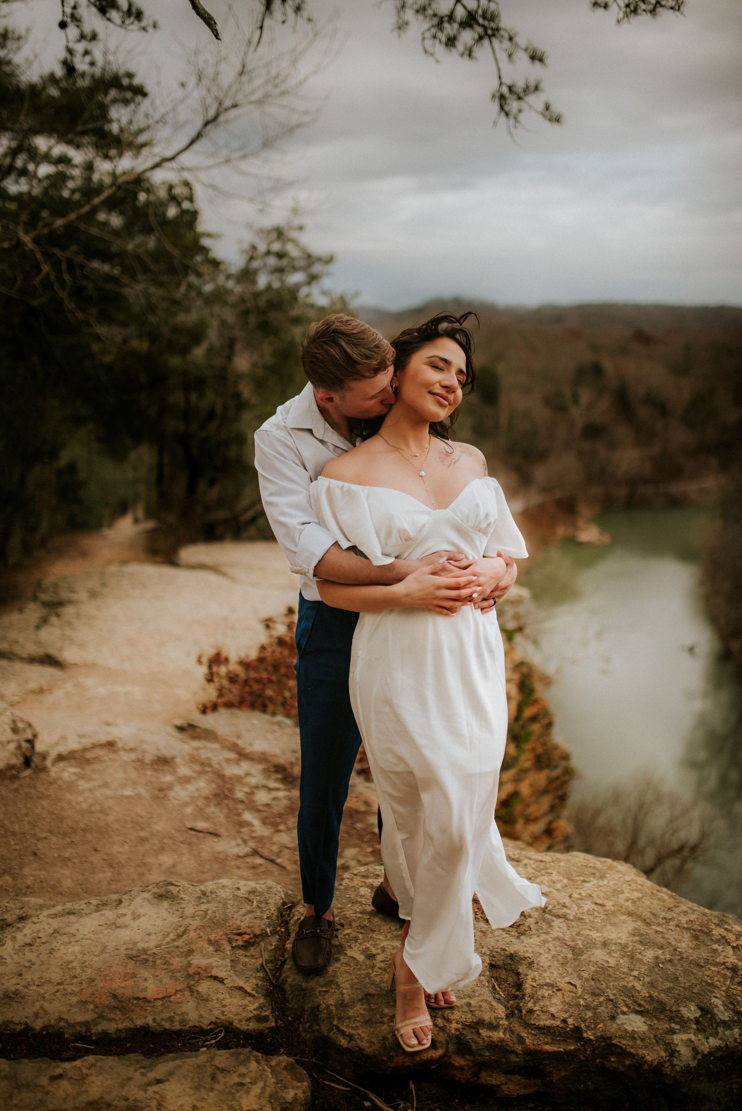 elopement couple after ceremony cozying up while elopement photographer takes a photo close to Nashville, Tennessee.
