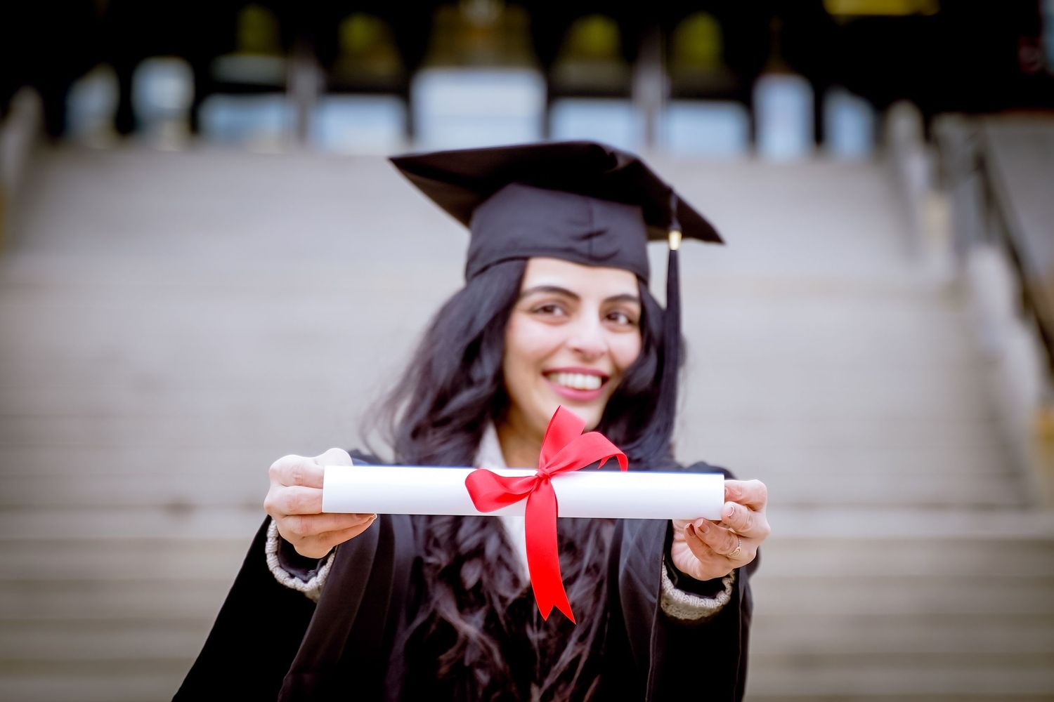 Graduation photo of MUN students in their gowns and caps during convocation, showcasing their achievement.