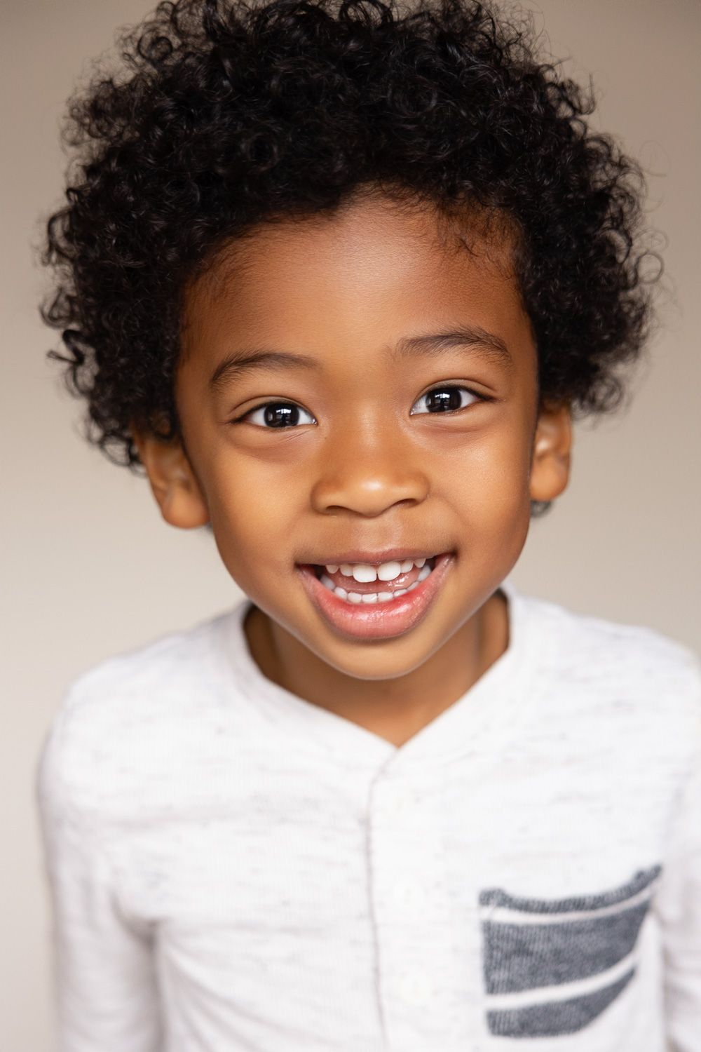 Child smiles during his preschool photography session in the Bay Area