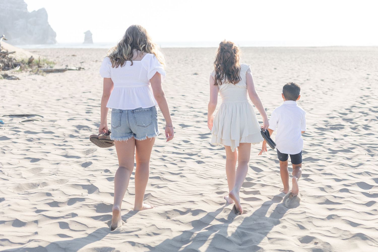 Family photo outfits in soft neutral tones on the Central Coast