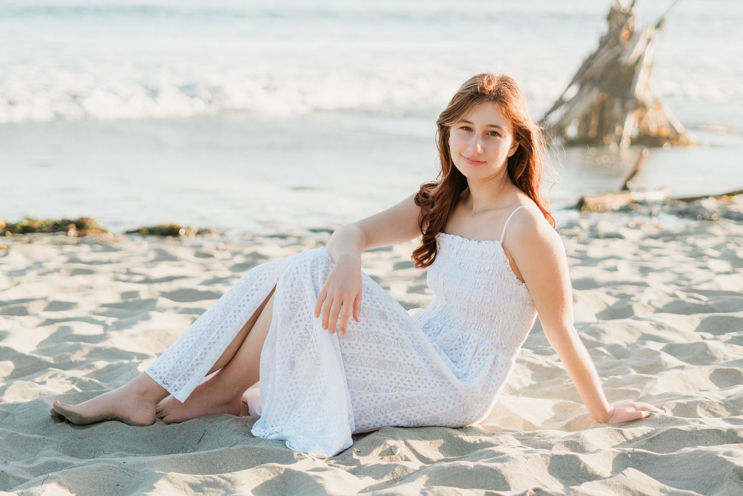 SLO High School senior session in Avila Beach in white dress on the beach by Felisha Connolly Photography