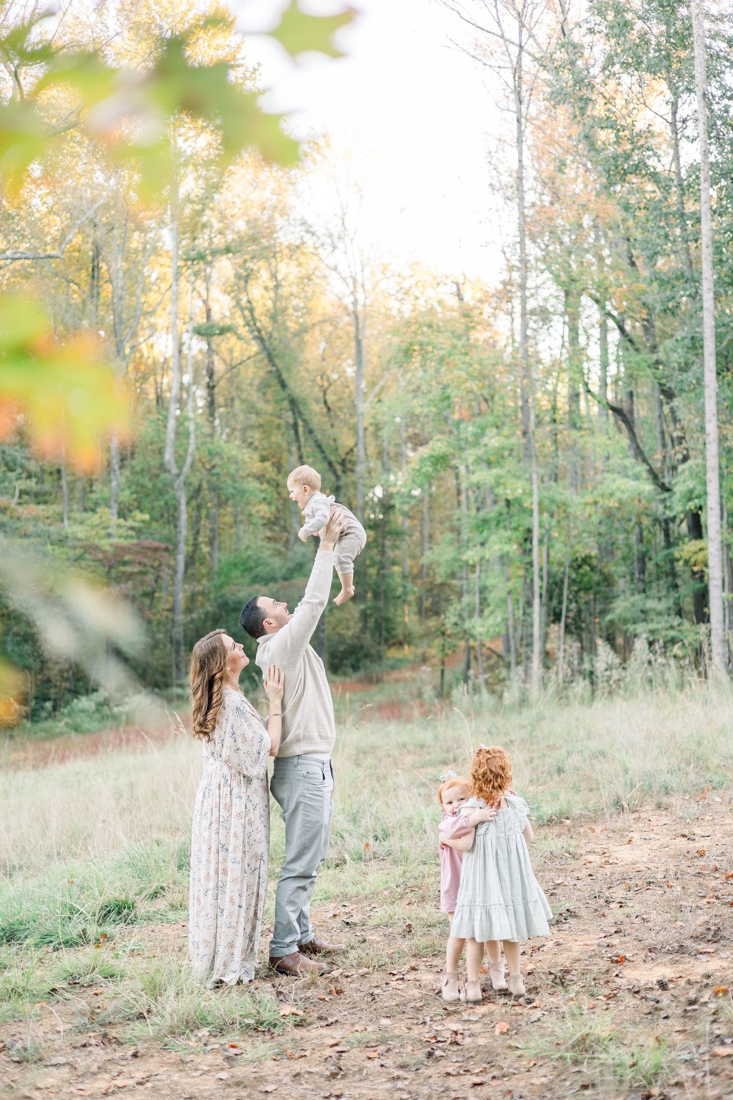 Outdoor fall family session in a golden field in Augusta, GA.