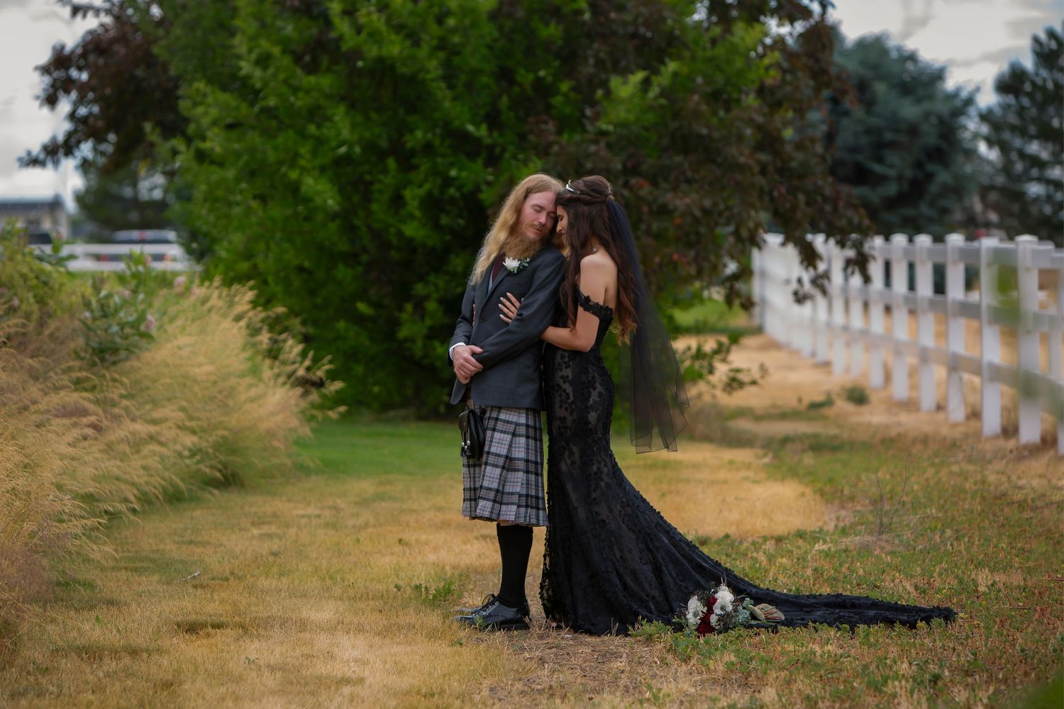 Castle Gardens Kuna Idaho Milestones Portraits Milestones Studios LLC bride and groom looking at each other
