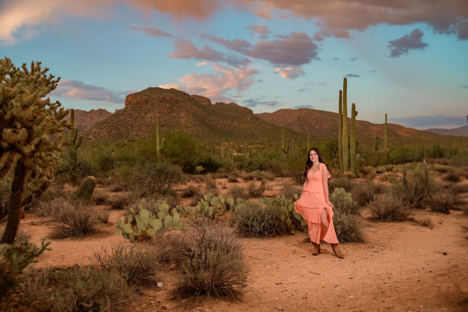 Senior destination session in the desert at sunset Tucson, AZ with monsoon sky's