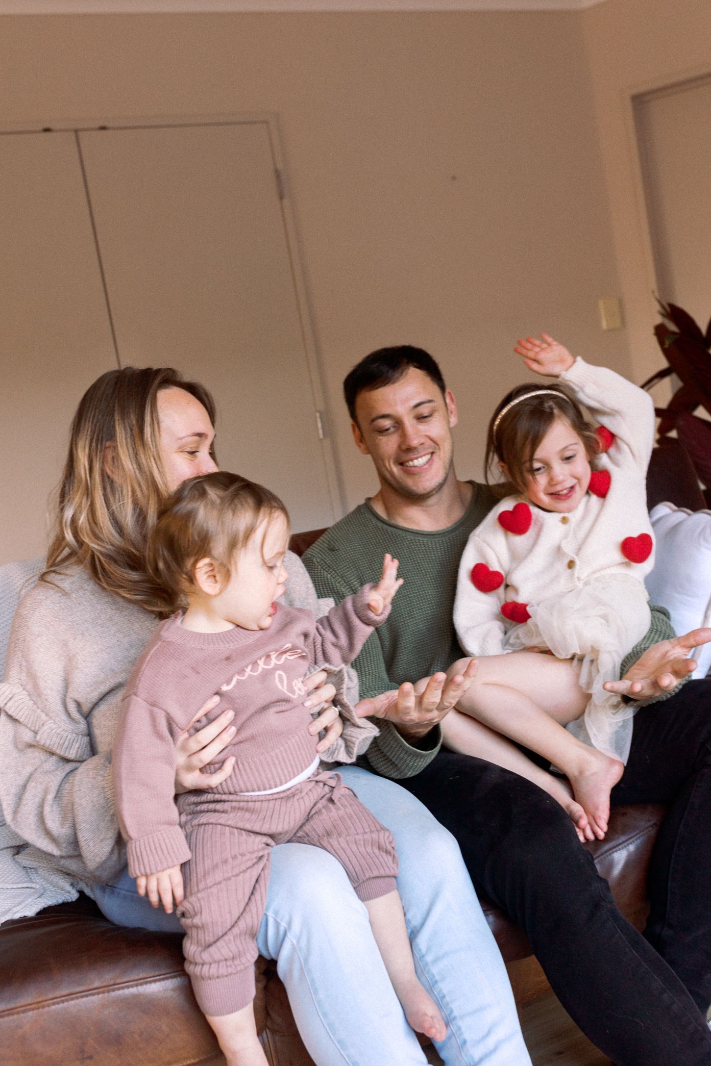 Sequence of playful photos showing animated interactions between family members in a living room setting.