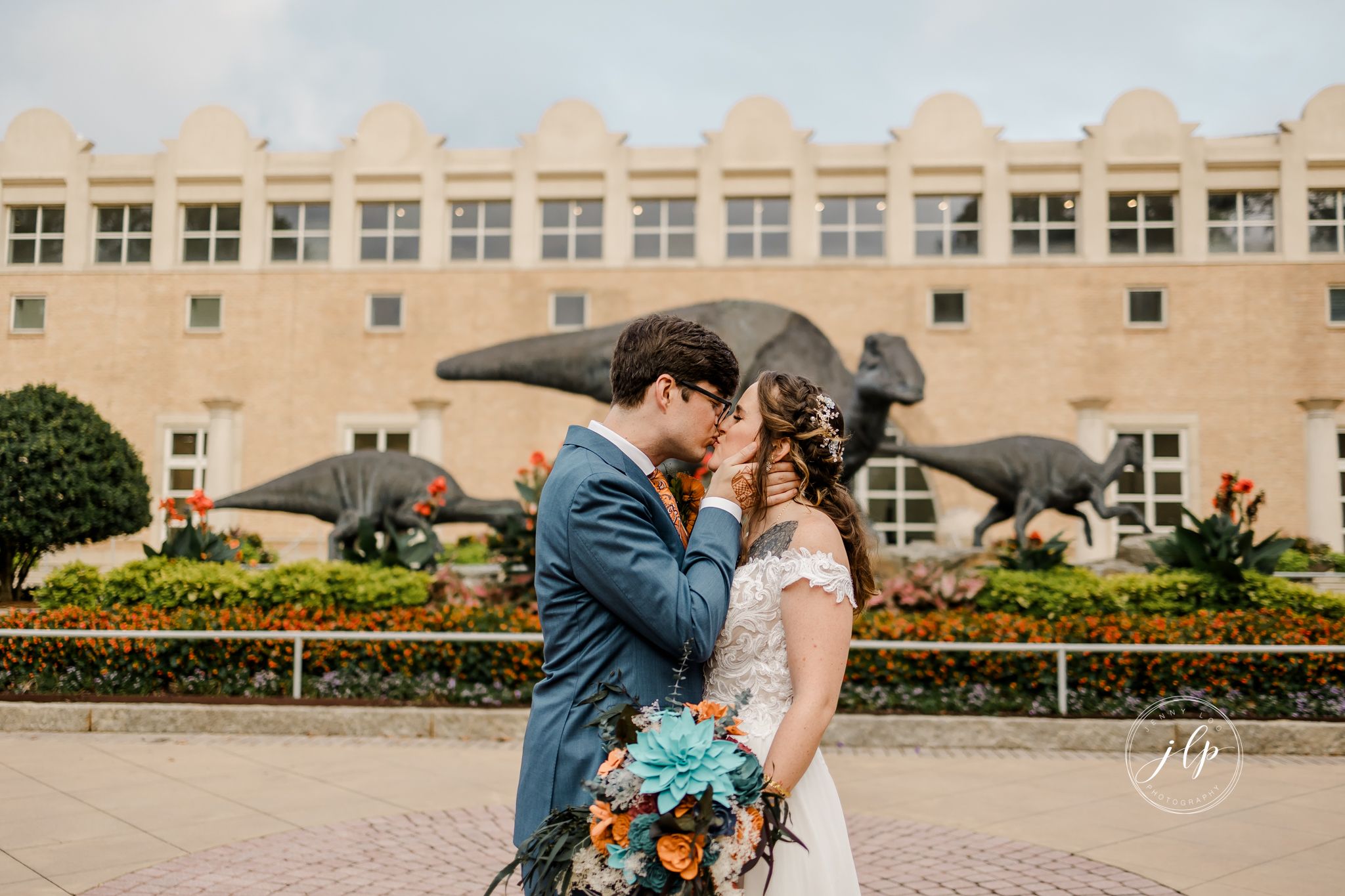 Mediterranean style wedding venue with elegant architecture and palm trees.