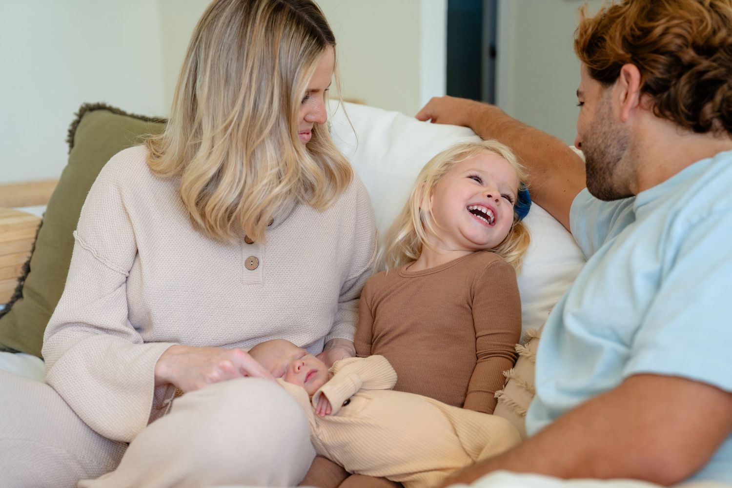 A sequence of photos showing people laughing and enjoying a relaxed conversation while sitting on a couch.