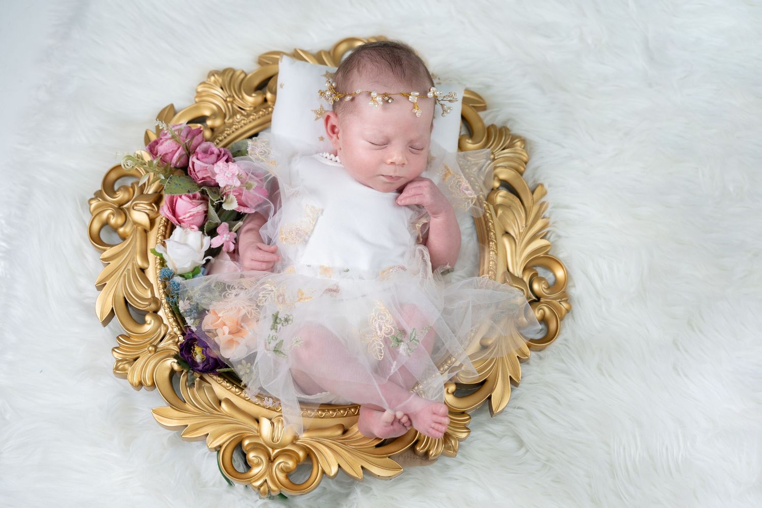 Newborn baby photo taken in a studio newborn photoshoot Dubai