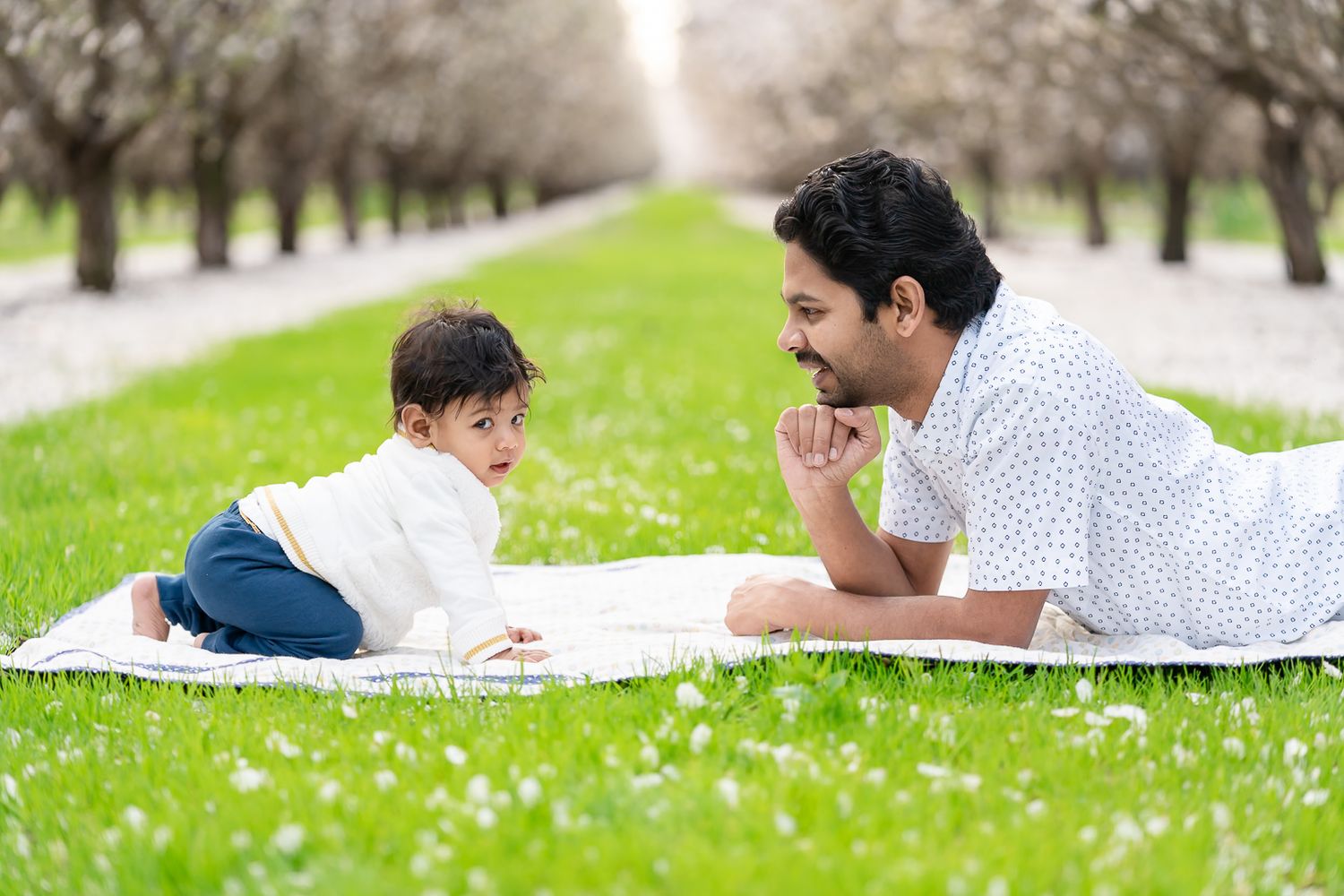 Sibling love under blooming almond trees! Captured in Tracy, California, during the almond blossom season. Perfect for family photography