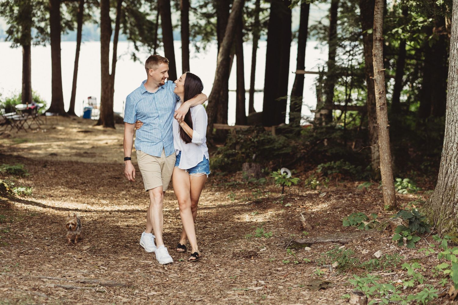 A professional photo of a couple in the woods