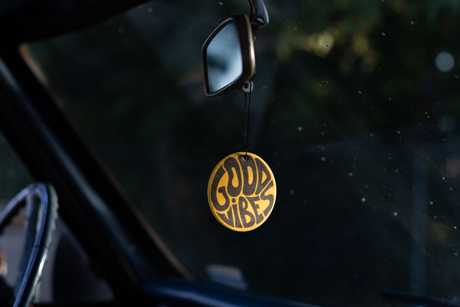 Detail shots of vintage gold circular emblems on a dark background.