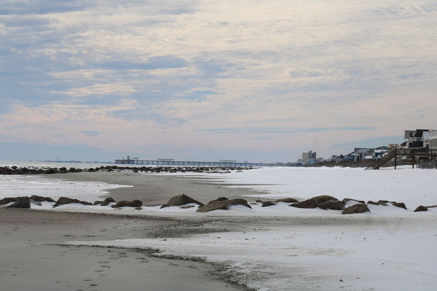 Snow on Folly beach in Charleston, South Carolina. First snow fall in six years in the low country. Surfing and sledding at an all time high