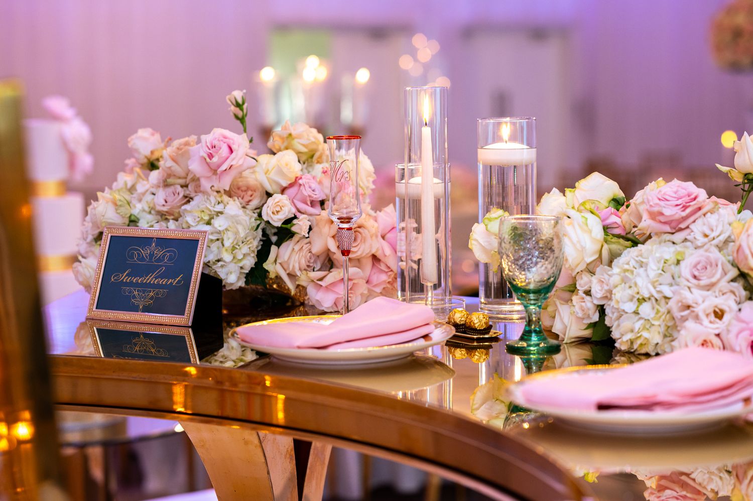 Palm Beach destination wedding, sweetheart table at Beachfront wedding Four Seasons, captured by Luxury wedding photographers Florida