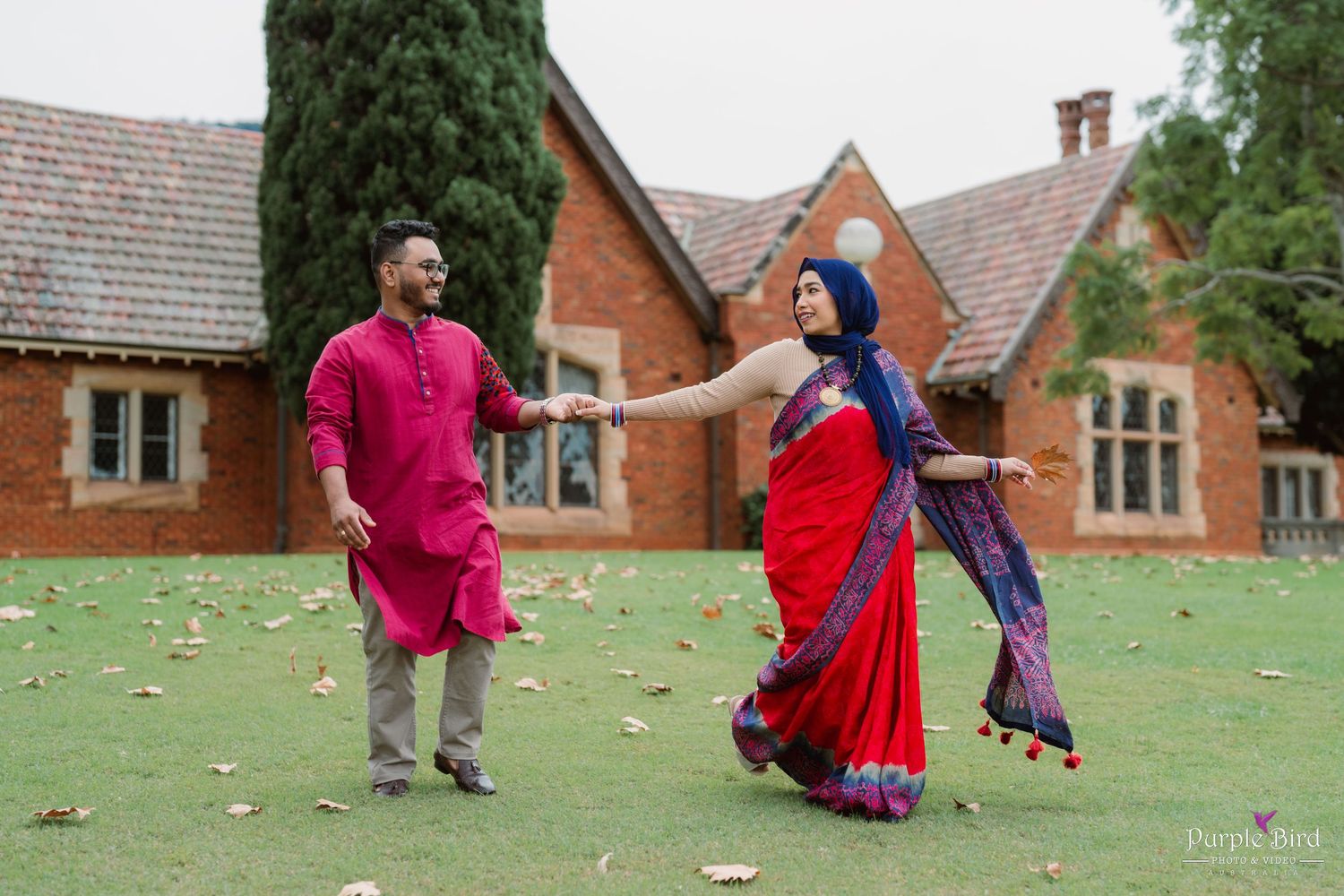 A photoshoot sequence in a grassy courtyard shows tender moments near red brick buildings on a relaxing afternoon.