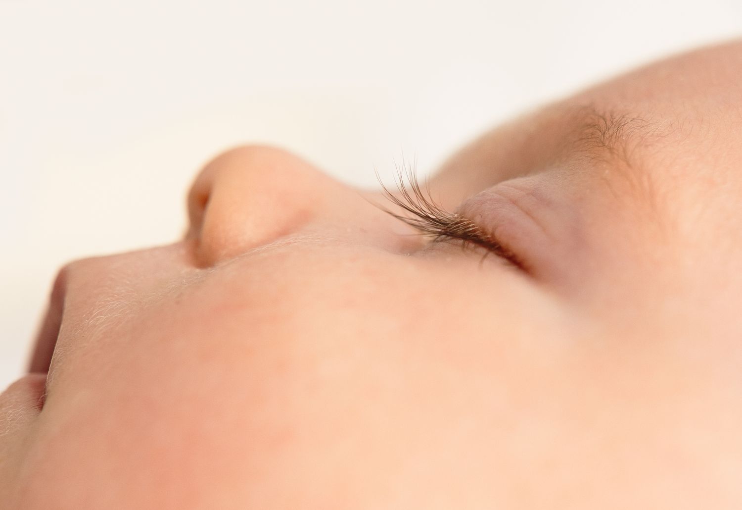 Charlottesville photographer, newborn, maternity, family, baby girl sleeping with focus on her long eyelashes