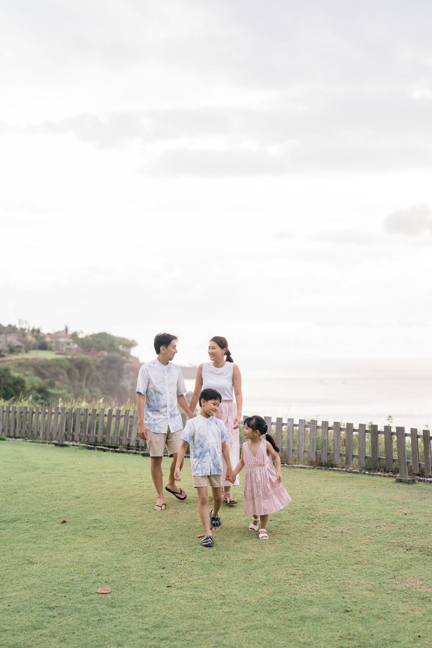 Natural family portraits captured at AYANA Resort Bali.