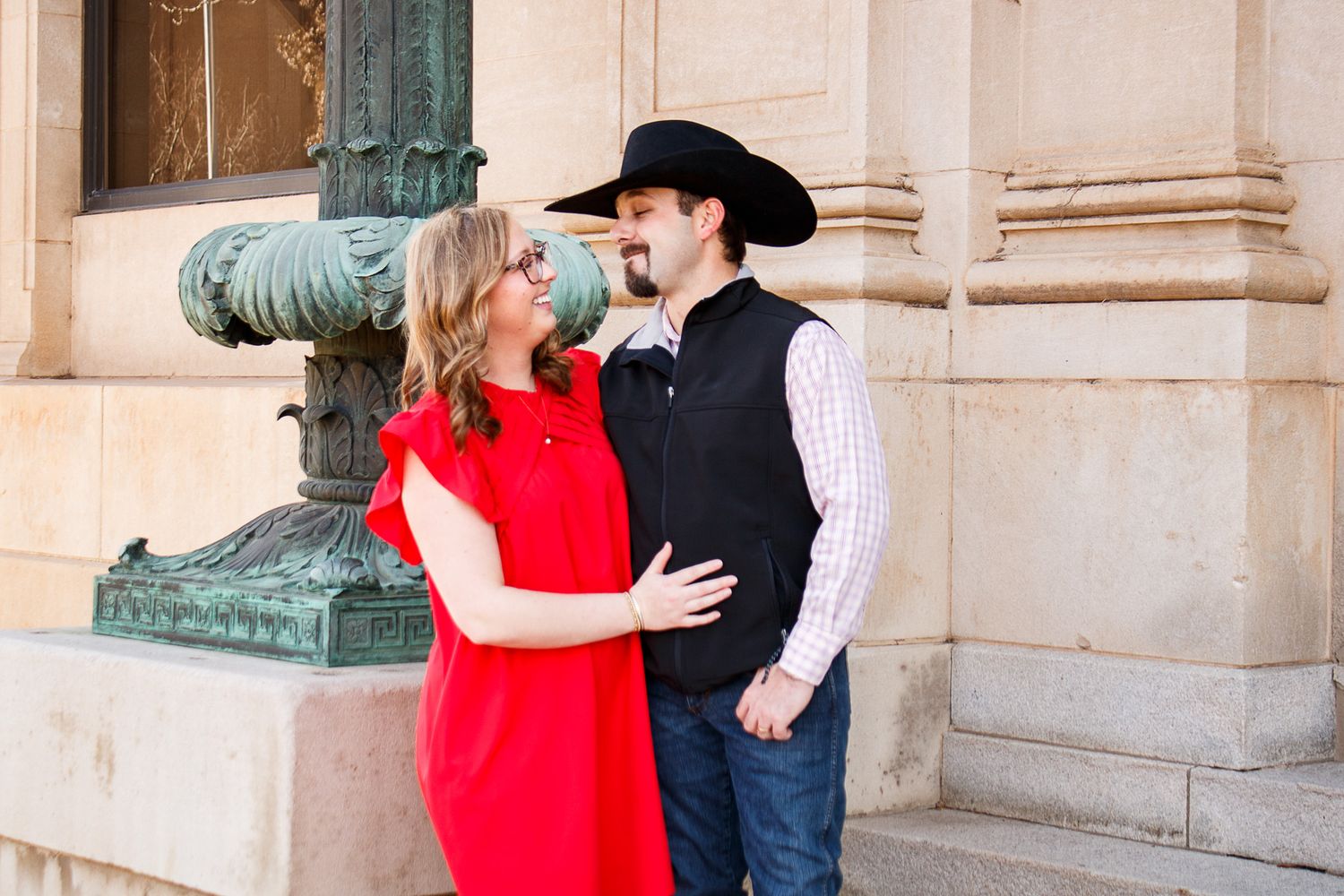 A young couple during a couples photo session at Downtown in Amarillo, Texas