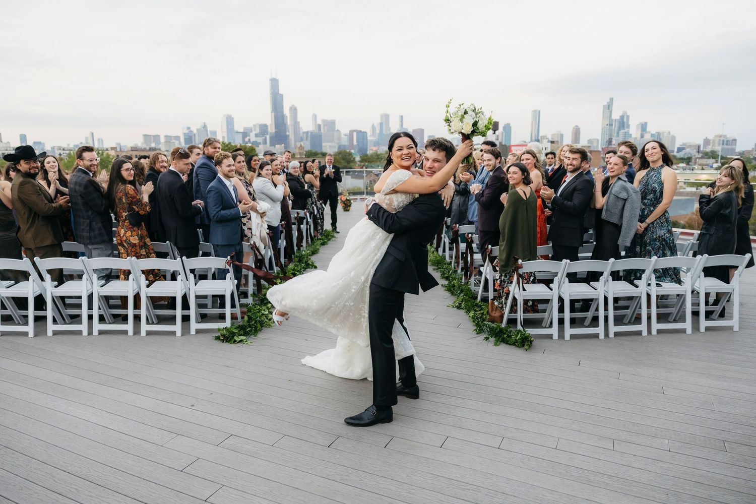 A panoramic sequence of wedding ceremony photos showing guests seated outdoors with the Chicago skyline in the background.