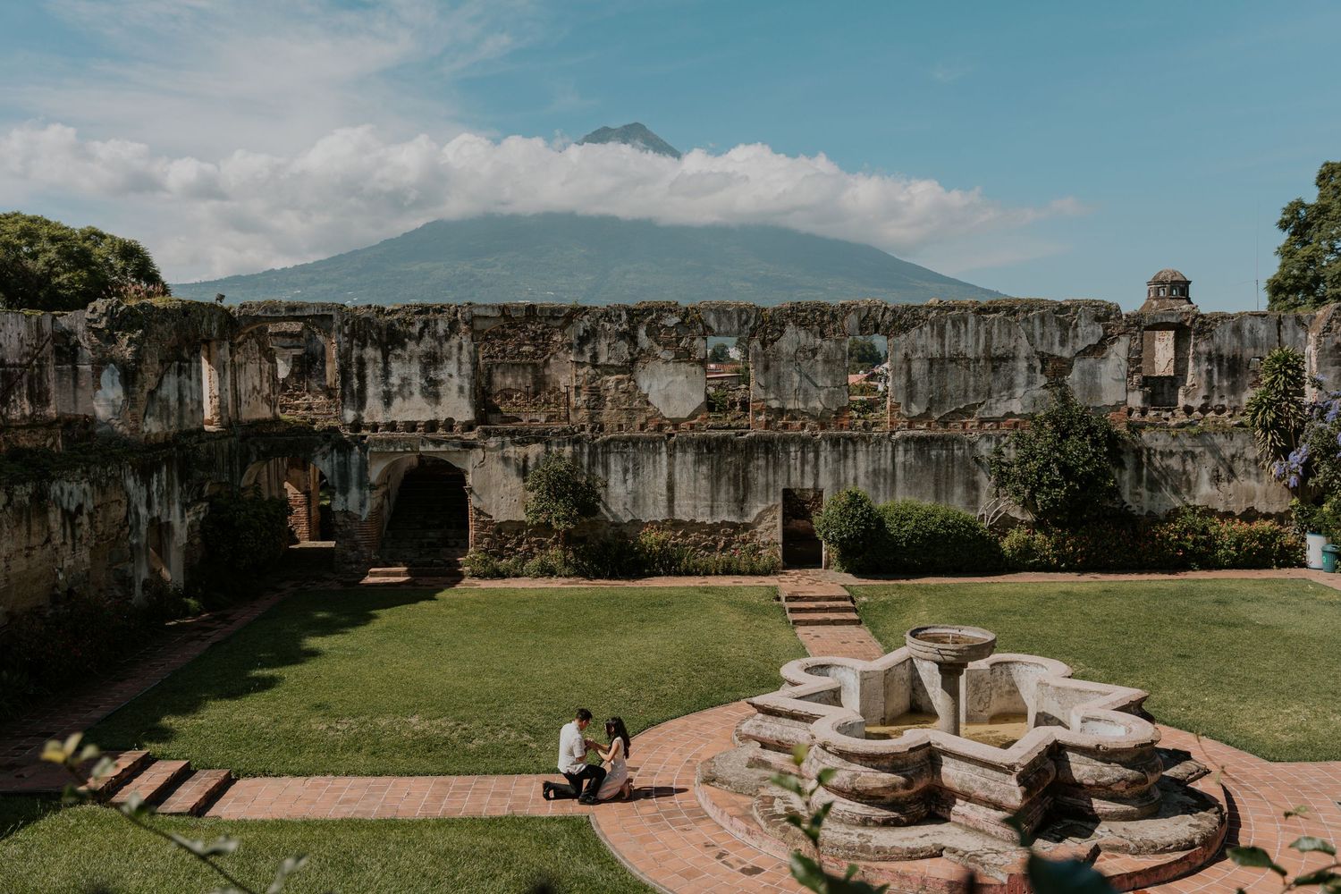 A scenic panoramic view of Lake Chapala in Mexico with mountains and calm waters stretching across the horizon.