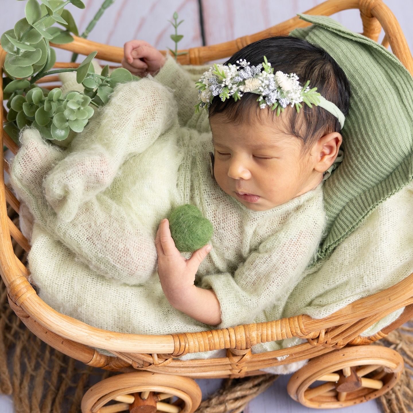 Newborn lying on a blanket photographed by newborn photographer Dubai