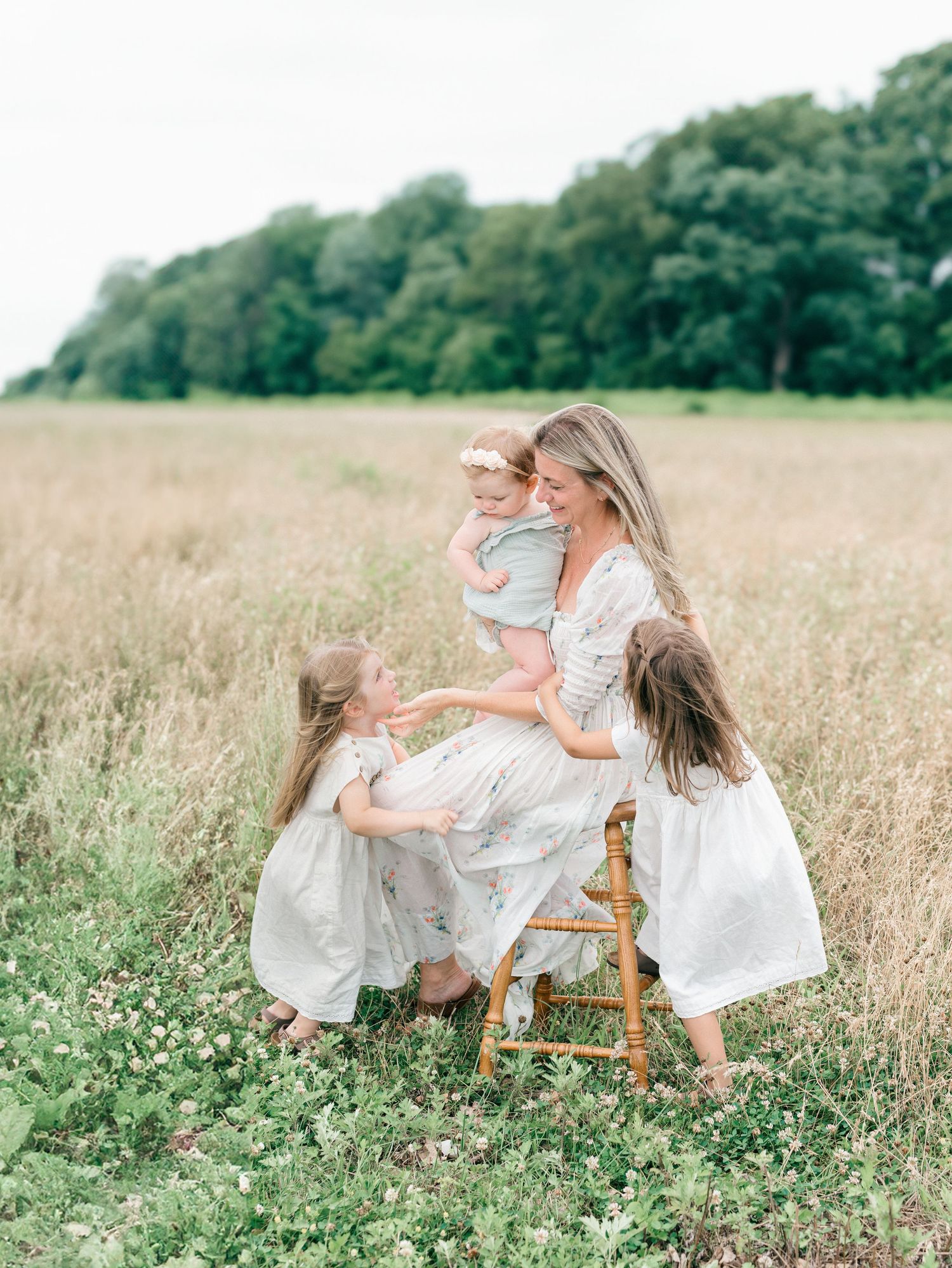 A pelvic floor specialist in Monmouth county NJ is photographed with her three daughters.