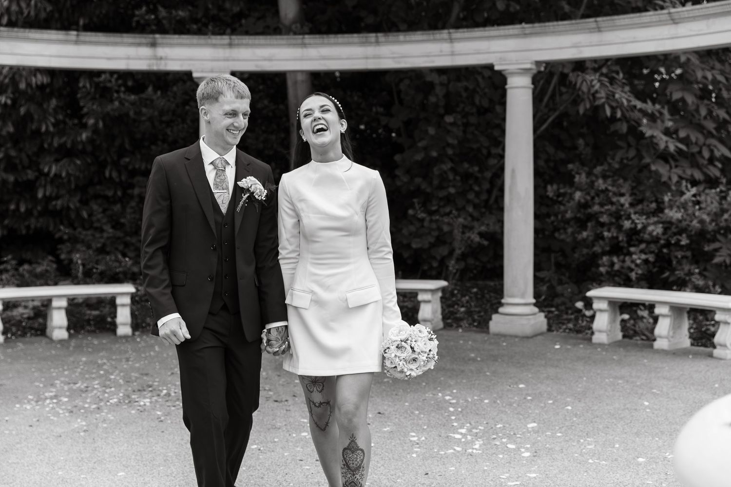 A series of black and white wedding photos showing a couple in formal attire walking outdoors. Photographer. Hull. East Yorkshire. Photo