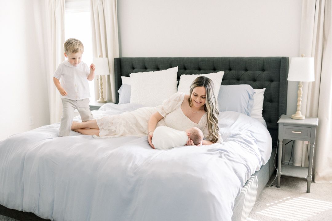 Quiet newborn moment with parent during in-home session in Augusta, GA