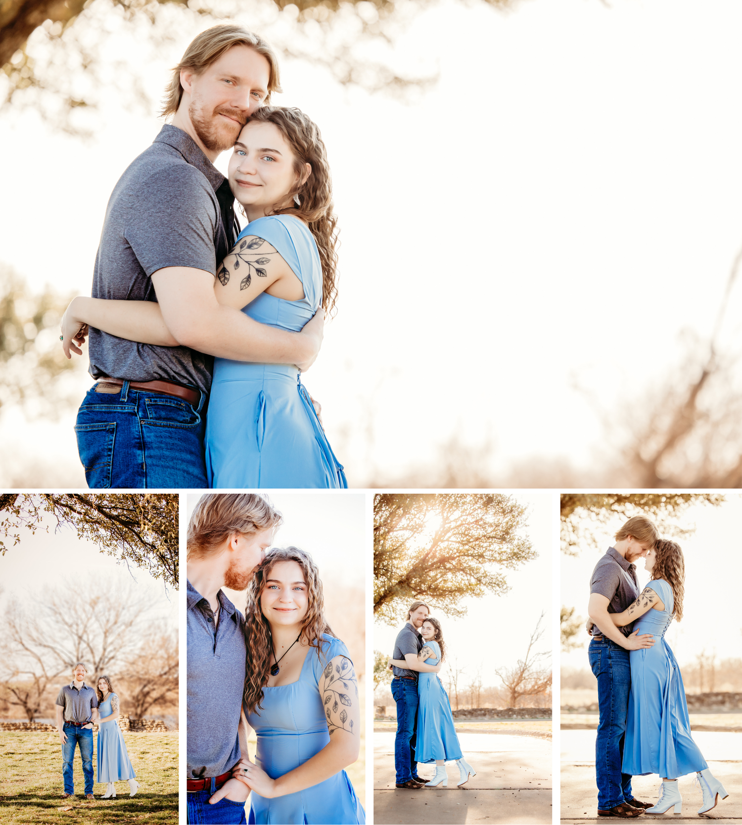 A couple in blue and grey outfits embrace during a sunset photoshoot in a rustic outdoor setting.