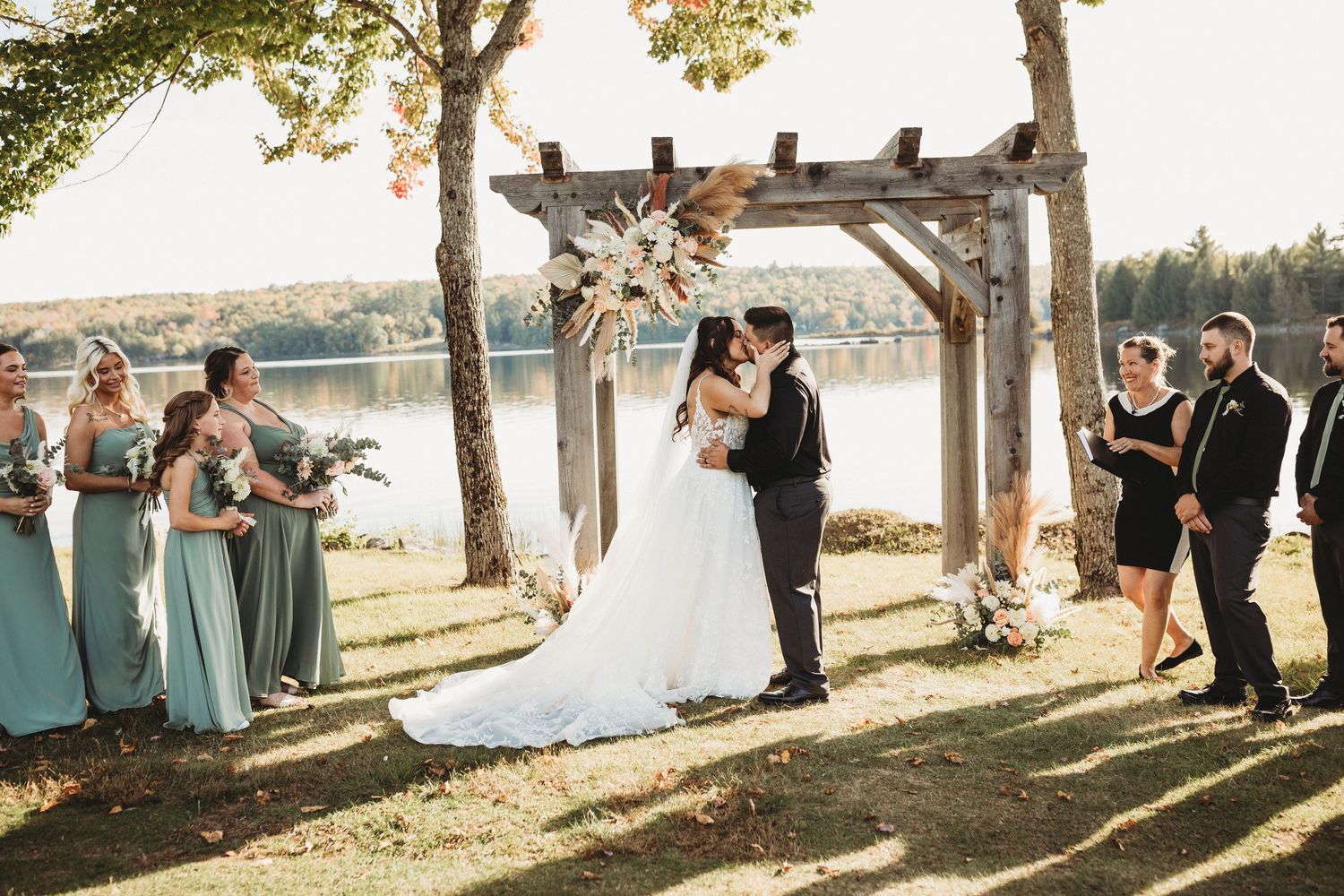 Professional wedding photograph first kiss