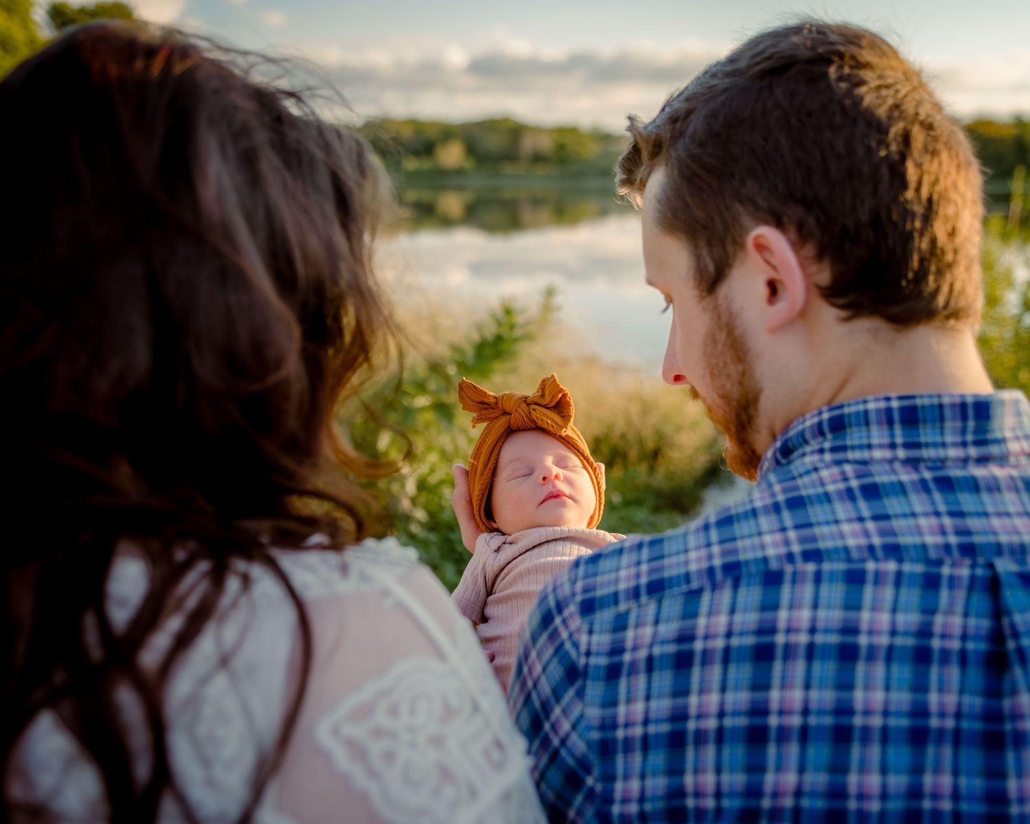 outdoor newborn session by a hidden lake in fort worth