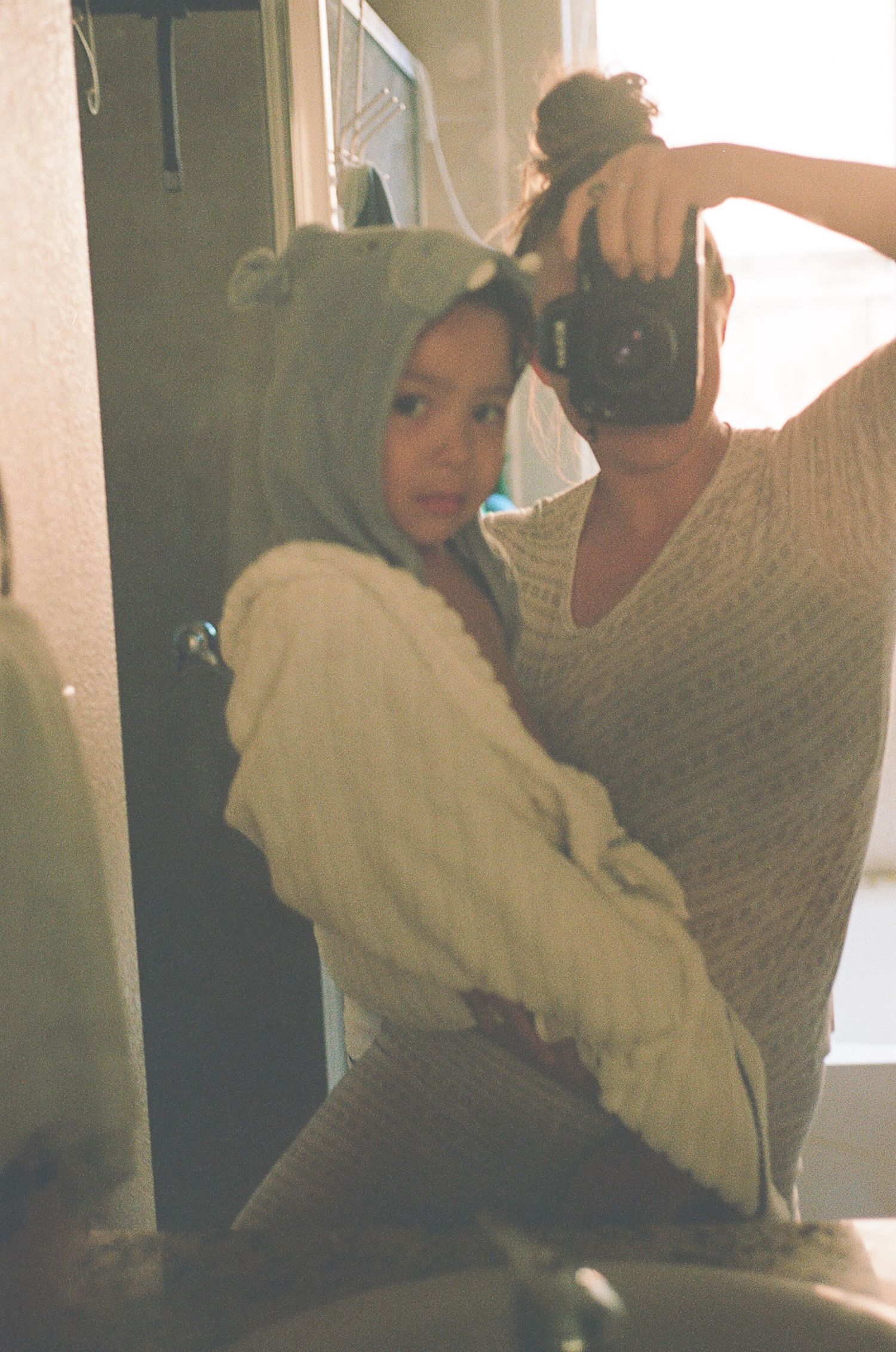 Indoor snapshots showing people relaxing with blankets in warm light.