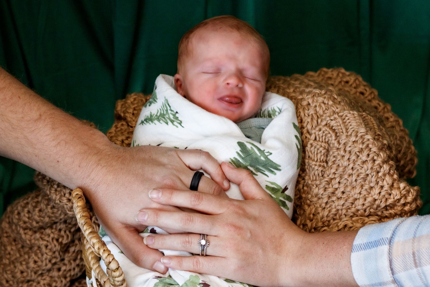 A baby boy during a newborn photo session at a studio in Amarillo, Texas