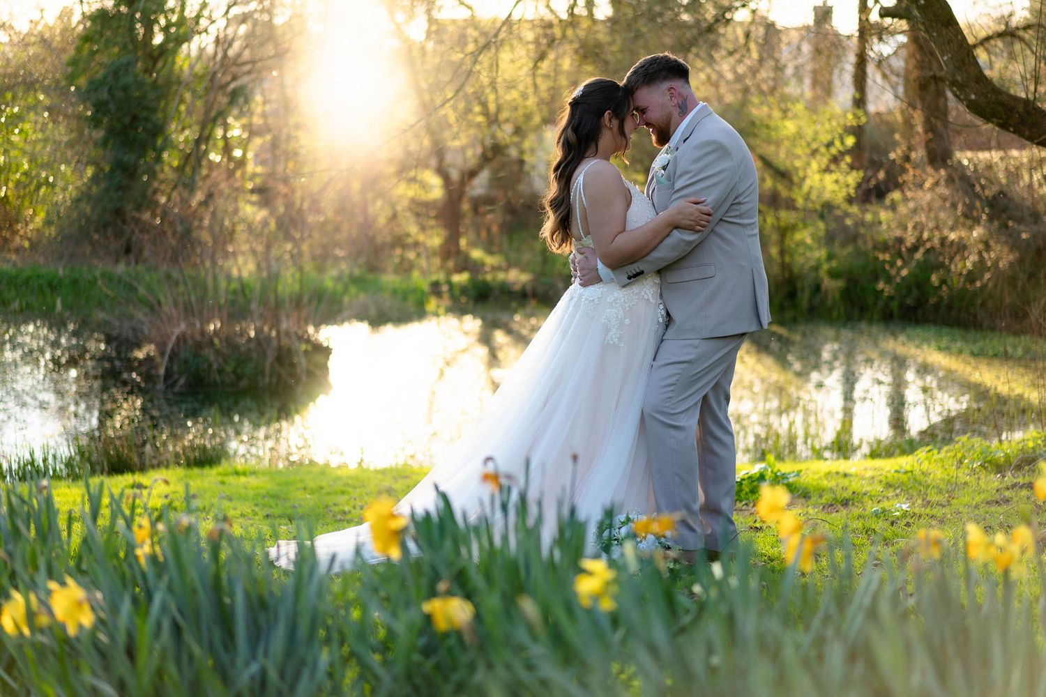 Bride and Groom with beautiful spring sunshine at Crowcombe Court