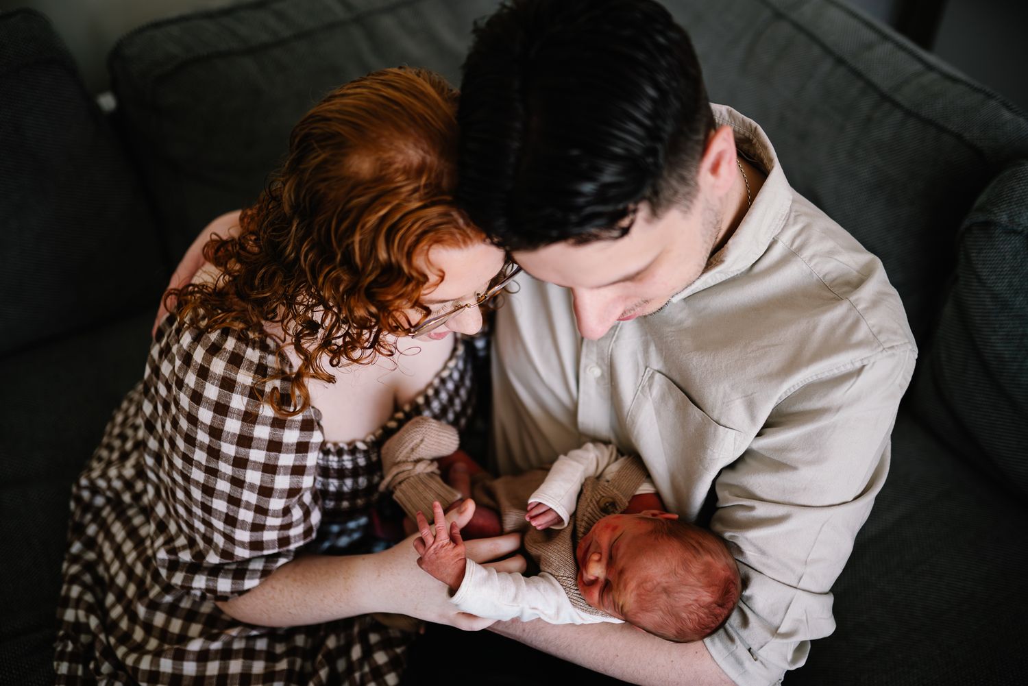 A series of photos showing tender moments between parent and newborn baby taken by Melbourne maternity and newborn photographer.
