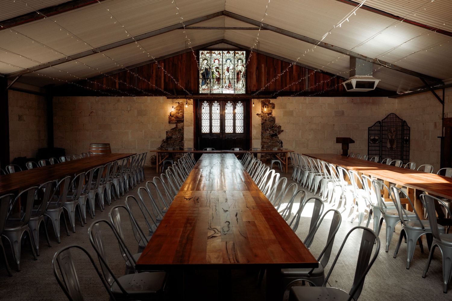 The Inside of the Estate at Chapel Farm, a building with Church and Winery style interior.