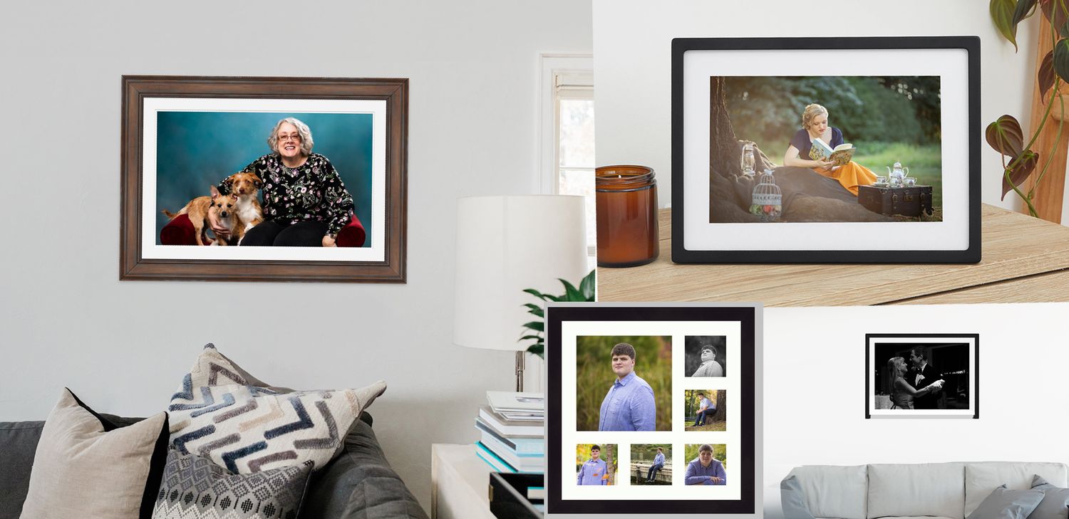 A gallery wall displays multiple framed photographs and artwork in a clean, modern arrangement against a white wall.