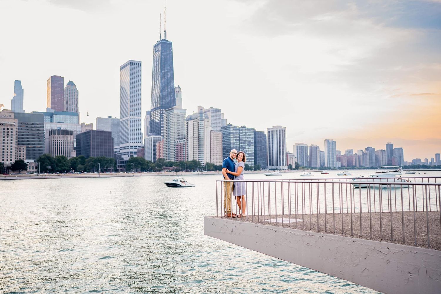 Runner admiring sunrise over Chicago skyline from Navy Pier with Lake Michigan and skyscrapers in background.