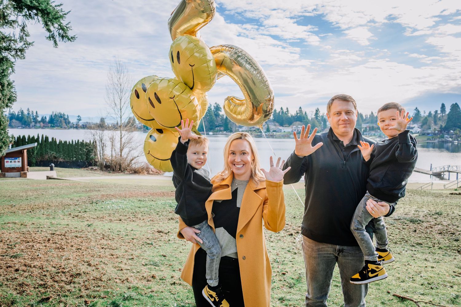 Family of four celebrating a fifth birthday at Angel Lake Park in SeaTac, Washington